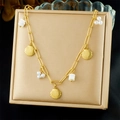 Detail of gold-plated necklace with shell charms and pearls on a premium jewelry box - Gold Shell Pearl Beaded Style(N3718)