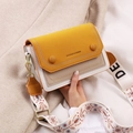Chic mustard and cream crossbody bag with a decorative wide floral embroidered strap - Yellow