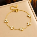 Golden clover bracelet with white floral charms on elegant leather jewelry box - Clover Bracelet (B1447)