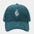 Detailed view of teal corduroy baseball cap with white skeleton hand embroidery - Adjustable / Malachite green