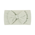 Soft nylon baby headband with a light green fabric bow decoration on a white background - Mint Green