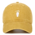Close-up of Grim Reaper embroidery on a vintage ginger yellow washed cotton baseball cap - Adjustable / Yellow