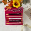 Bachelorette pen set with humorous slogans on pink and black barrels for gift-giving - Bachelorette Party