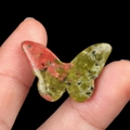 Natural unakite butterfly stone carving with green and pink speckled mineral texture - Unakite