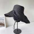 Detail of wide brim black sun hat showing textured quick-dry fabric and windproof cord - Black