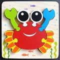 Cartoon red crab wooden puzzle for toddlers with colorful claws and sea life background - Snap Puzzle-Crab (卡扣JM-螃蟹)
