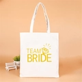 White canvas Team Bride tote bag with gold lettering and diamond graphic for hen parties - Style C (Team Bride/Yellow/Diamond)