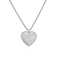 Macro shot of silver heart pendant with pave cubic zirconia and rope chain detail - Platinum Heart