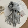 Grey cashmere-like scarf with fringe and minimalist label on a white table - 200cm / Light Gray