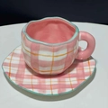 Pink checkered irregular ceramic coffee cup and saucer with orange lines and blue trim - Grid Cup & Saucer