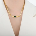 Elegant gold snake chain necklace with an oval green gemstone pendant on model - 41+5cm / Gold Green Glass Stone Necklace