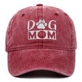 Detail of Dog Mom embroidery and paw print on washed red cotton baseball cap - Burgundy