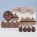 Earthy tone makeup tool set featuring sponges, beauty blenders, and plush bow headband - Brown