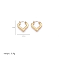 Detail shot of heart-shaped gold hoops showing dimensions 2.4cm by 2.3cm and 8.4g weight - Geometric Polished Heart