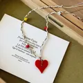 Detail of red heart pendant necklace with multi-color braided cord and colorful beads - Red Heart (1# Necklace)