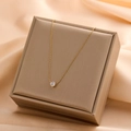 Elegant gold titanium steel necklace featuring a sparkling solitaire zircon pendant. - Six-Claw Single Rhinestone Style (8203)