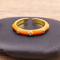 18K vergulde ring met levendig oranje emaille inleg en sprankelende witte zirkoon - Oranje