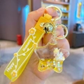 Star-shaped liquid keychain with white unicorn and yellow happy moments wristlet strap - Yellow-Star Unicorn