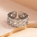 Adjustable silver titanium steel ring with Celtic knot braided hollow design - Steel Color 130