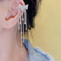 Silver bow knot ear cuff with long rhinestone fringe tassels on woman's ear - E0448 Silver Needle Pair (Bow Ear Clip Tassel Silver)