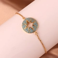 Close-up of gold-plated bracelet with star motif pendant and turquoise bead accents - Hollow Star Evil Eye Style (款式一)