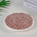 Natural strawberry quartz crystal stone chips displayed on a white decorative plate - Strawberry Quartz (3-5mm) 100g