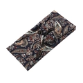 Detail of dark blue paisley yoga headband with knot design and soft fabric texture - Navy Blue Paisley Pattern