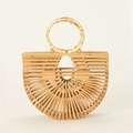 Detailed close-up of handmade semicircular bamboo handbag with circular wood handle - AJ-2 Beige