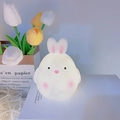 Cute white bunny night light in soft silicone glowing on books for bedroom decor - Cute Rabbit