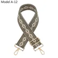 Close-up of diamond pattern jacquard strap with gold-tone metal lobster clasps and buckle - Army Green
