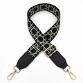 Detail of adjustable wide shoulder strap with beige geometric embroidery and gold hooks - Black Mesh