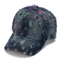 Close-up of distressed denim baseball cap with colorful woven layers under ripped fabric - Dark Blue