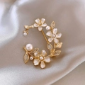 Elegant gold flower brooch featuring white petals, pearls and crystals on silk background - Floral Pearl Brooch(454#)
