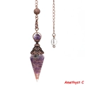 Detail of Amethyst crystal pendulum with copper wire wrap and vintage crown cap - Amethyst Ancient Bronze
