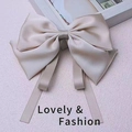 Eleganter champagnerfarbener Satin-Haarclip mit großer Schleife für Mädchen - Satinschleife mit Band / Beige