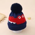 Dettaglio del cappello a maglia dinosauro per bambini con motivo mostro e grande pompon - Taglia Unica(2-6 Anni) / Blu