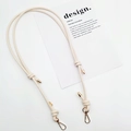 Detail of adjustable beige leather shoulder strap with gold metal spring buckles and hardware - Gold Plate Hook / Off White
