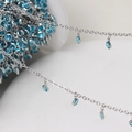 Macro detail of silver DIY chain with small blue crystal round pendants for jewelry making - Silver Chain - Aqua Blue Stone
