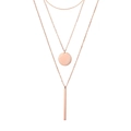 Macro view of triple-layered rose gold chain necklace with geometric circle and bar pendants - Rose Gold
