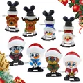 Wind-up Christmas toys set featuring Santa, penguin and reindeer on white background - Christmas Wind Up 8pcs Set D