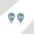 Macro view of pear-shaped blue gemstone earrings with halo diamonds in s925 silver - 925 Silver / Aquamarine Blue (March)