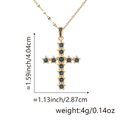 Gold-plated cross pendant necklace with blue cubic zirconia stones and 4cm dimensions - Style X (Hollow Cross/Blue Zirconia)