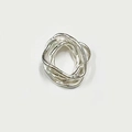 Silver multi-layer wrap coil ring featuring a minimalist layered metallic structure - Silver