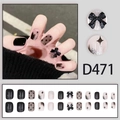 Faux ongles courts avec nœud noir, dégradé aurore et paillettes argentées brillantes - Style Dégradé Nœud Noir (Type Colle D471)