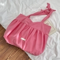 Pink pleated canvas tote bag with adjustable bow shoulder strap and brand label - Pink