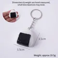 Realistic triangular sushi rice ball keychain with seaweed wrap and 3.5cm size detail - Seaweed Triangle Rice Ball With Keychain