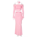 Detailed view of pink two-piece set featuring off-shoulder top and maxi skirt with flower detail - S / Pink