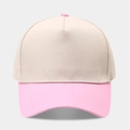 Detailed close-up of the beige and pink two-tone five-panel cotton twill baseball cap - Beige/Pink
