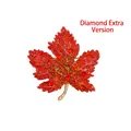 Sparkling maple leaf brooch featuring vibrant red rhinestones and a gold-tone finish - Red (More Rhinestones)