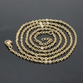 Classic golden stainless steel O-chain necklace with lobster clasp on grey background - Gold O-chain 45+5cm